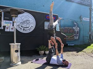 Chilling while we wait for our burgers. at Nom Burgers in Austin