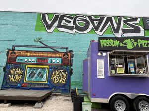 Murals and vegan pizza truck   at Nom Burgers in Austin