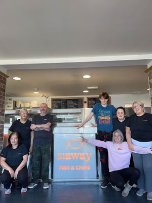 Our team next to our new frying range and revamped customer area at Siaway Fish & Chips in Isle Of Skye