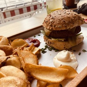 BBQ styled burger with vegan cheese, fries   at Cafe Gutenburger in Marburg