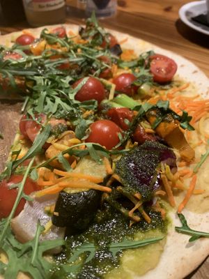 Nice, affordable restaurant, multiple vegan options for starters and mains. This vegan pizza was most delicious, with various vegetables and pesto.   at S'Wirtshaus in Saalbach