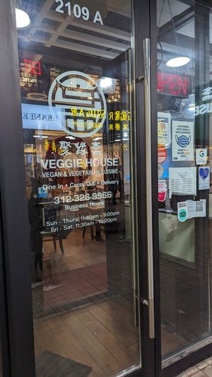 Restaurant Door and Hours at Veggie House  in Chicago