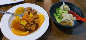 Orange Tofu (left) and Wonton Soup (right) SO GOOD! at Veggie House  in Chicago