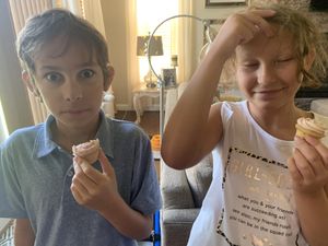 Two cupcake customers enjoying their cupcakes! at Cupt Cupcakes in Silver Spring