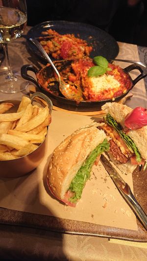 Vegan burger & fries and lasagna at Pratu's in Alcobaca