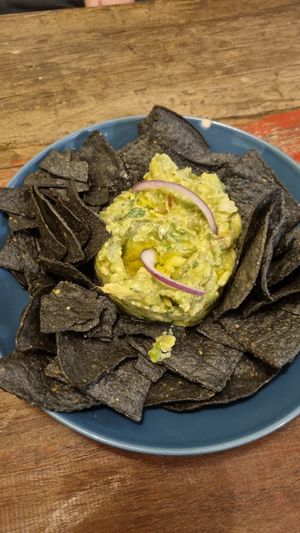 Black nachos with home made guacamole at Fresh Green in San Sebastian