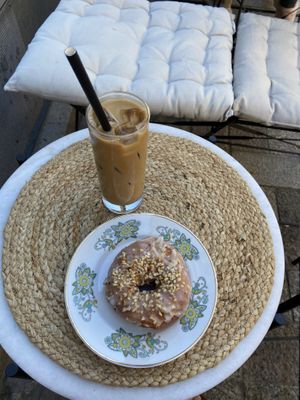 Iced latte and cardamom donut  at Round & Square in Helsinki