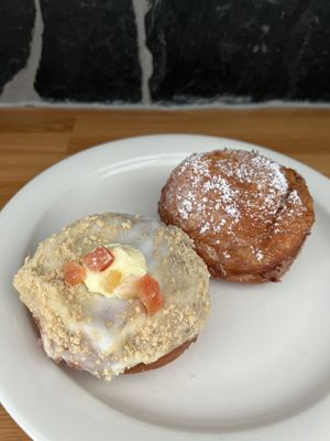 Spring fruit cookie donut and chocolate raspberry donut. They had several other amazing-looking flavors too! Really good raises donuts with nice flavors.   at Round & Square in Helsinki