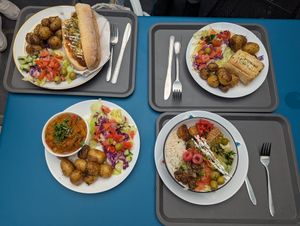 Meatball sub, sausage roll, curry and Buddha bowl. at The Green Kitchen in Newport