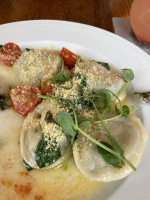 Kreplach dumplings with kale (2 of them already gone)  at Szklarnia Warszawa in Warsaw