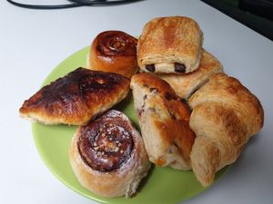 Clockwise from top: chocolate croissant, croissant, raisin bread, hazelnut roll, ginger pearl sugar bread, cinnamon roll...all amazing at De Broodenier in Leuven
