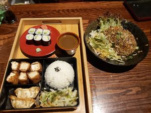 Left: Tofu katsu bento box, veg gyoza, salad (with coriander/cilantro sauce ask to remove if this taste like soup to you) cucumber & avo maki  

Right: vegan rice stirfry (no egg) at Japan Street Food in Paisley