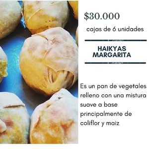 It is a vegetable bread filled with a soft mixture based mainly on cauliflower and corn at Ojalá Comida Saludable  in Bogota