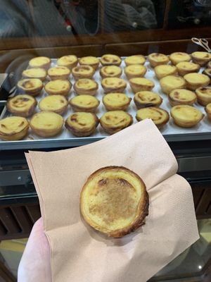 Nata with a dusting of cinnamon   at Vegan Nata - Chiado in Lisbon