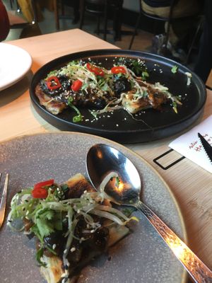 a chinese dish with mushrooms (vegan)  at HANNO Groots Café in Delft