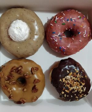 Phileas fog, strawberry, maple pecan, peanut butter at La Beignerie in Montreal