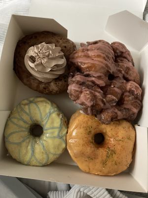 Coffee, raspberry fritter, lavender-lemon and mango-cayenne pepper  at La Beignerie in Montreal