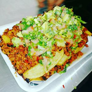 Loaded fries with pastor at Veganos La Taqueria in San Cristobal De Las Casas
