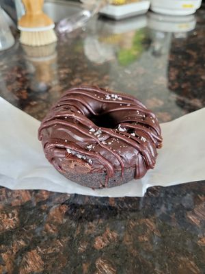 Double chocolate: chocolate cake donut, chocolate glaze, chocolate drizzle, and sea salt #Veganuary at Beacon Doughnuts in Chicago