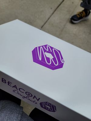 Cute package you get from the back alley at Beacon Doughnuts in Chicago