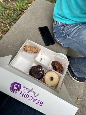 The aftermath (clockwise from top left): cinnamon coffee cake, salted caramel mocha, vanilla bean cronut (minus top layers), Boston cream at Beacon Doughnuts in Chicago