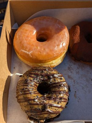Devil's Caramel and Sea Salt, Raised Glazed Brioche, Boston Cream at Beacon Doughnuts in Chicago