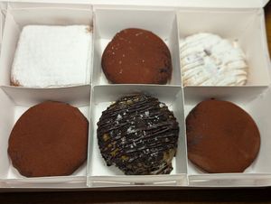 3 Boston Cream, Raspberry Grapefruit Beignet, Devil's Caramel and Sea Salt, Blueberry Pancake at Beacon Doughnuts in Chicago