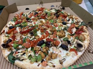 Pizza with added Chick’n  at OOSHMAN in Randwick