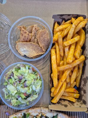 Fatoosh salad $6.95: great crispy fried zaatar chips but the salad was swimming in dressing and not fresh or crunchy; Lebo chips $9.95: marinated in touch of spice and garlic at OOSHMAN in Randwick