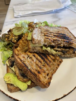 Avocado & mushroom toast at Bloomy Market in Setubal