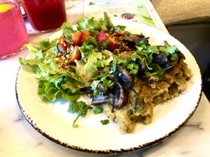 Migas de espargos e cogumelos 🍄  at Bloomy Market in Setubal