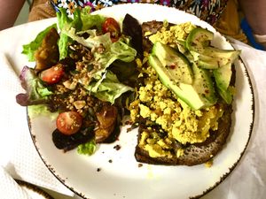 Tosta de tofu e abacate 🥑  at Bloomy Market in Setubal