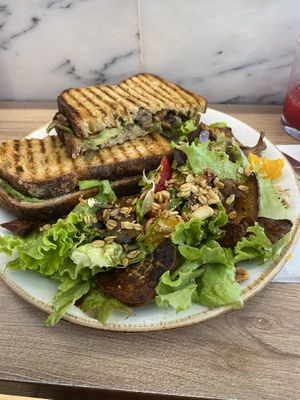 Avocado and mushroom toasts with salad  at Bloomy Market in Setubal