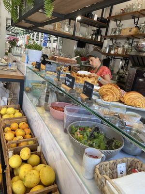 Super nice workers at the counter   at Bloomy Market in Setubal
