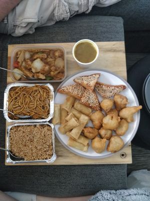 Noodles, vegan fried rice, vegan chicken satay, vegan chicken balls, spring rolls and prawn toast!  at In Cafe & Restaurant in Cardiff