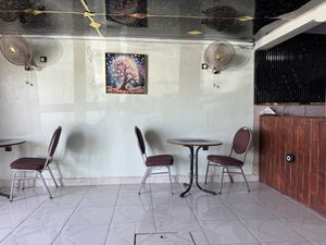 Eating area. AC in the room and fans    at India Gate in Nouakchott