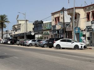 From the opposite side of the street coming away from the main city centre. It’s the Green frontage    at India Gate in Nouakchott
