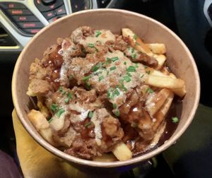 Oyster mushroom chick’n and chip gravy box at Vegan Noms - Pop Up in Brighton