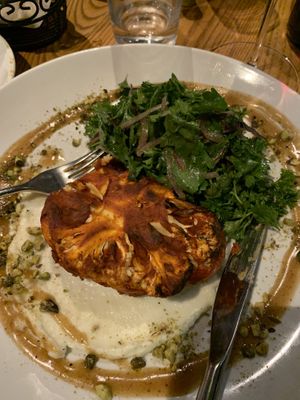 Cauliflower brushed with roasted red pepper over toum and a parsley salad  at TIQA in Portland