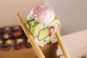 Sandicate Uramaki: brown rice, watermelon marinated in organic tamari and lime, avocado and topping of avocado sliced with pink cream cheese at Veganashi - Gluten Free Sushi in Barcelona