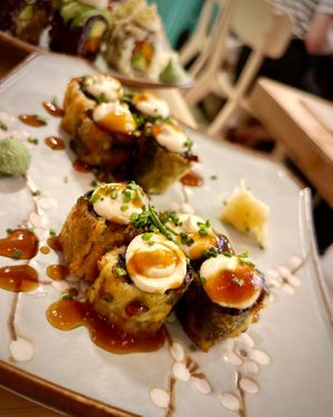 Tempura rolls with chickpea flour. Filled with sweet potato, spinach, cashew nut cream cheese topping and homemade teriyaki sauce. at Veganashi - Gluten Free Sushi in Barcelona