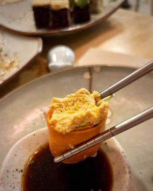 Tunesa: carrot gunkan filled with brown rice, rocket salad, crumbled organic tofu with vegan mayo and paprika at Veganashi - Gluten Free Sushi in Barcelona