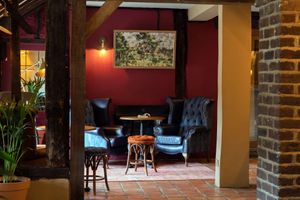 The fire place  at The Old Manor in Potters Bar