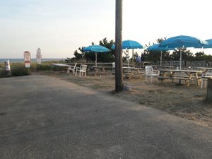 One of 2 seating areas over looking the beach at The Surf in Nantucket