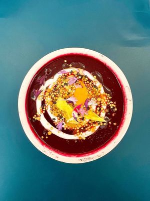 cold beet soup with a drizzle of cashew cream at Pequeno Café e Bistrô - Arroios in Lisbon