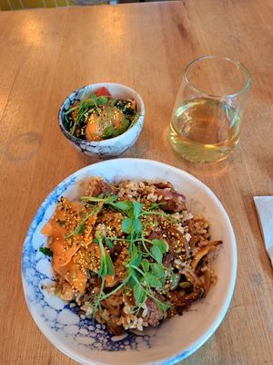 No duck rice with side salad and kombucha at Pequeno Café e Bistrô - Arroios in Lisbon