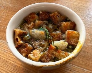 Soup of the week with coriander and croutons. at Pequeno Café e Bistrô - Arroios in Lisbon