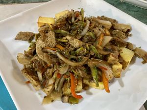 Trueno- local dish with mix of seitan, potatoes and veggies  at Estrella Negra in San Pedro De Atacama