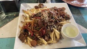 Stir fried veggies and fries. Like poutine  at Estrella Negra in San Pedro De Atacama