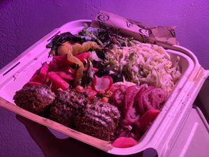 Falafel plate, the Airbnb room lighting was purpleish  at Dune in Los Angeles